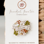 A magnetic Bloom Needle Minder