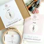 The floral initial embroidery kit featuring a hoop, pattern booklet and thread