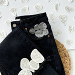 Examples of floral patterns that can be embroidered onto jeans