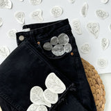 Examples of floral patterns that can be embroidered onto jeans