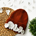  Floral embroidery designs with an example of how they can be embroidered onto a woolly hat