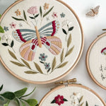 3 butterfly embroidery patterns and a magnetic needle minder
