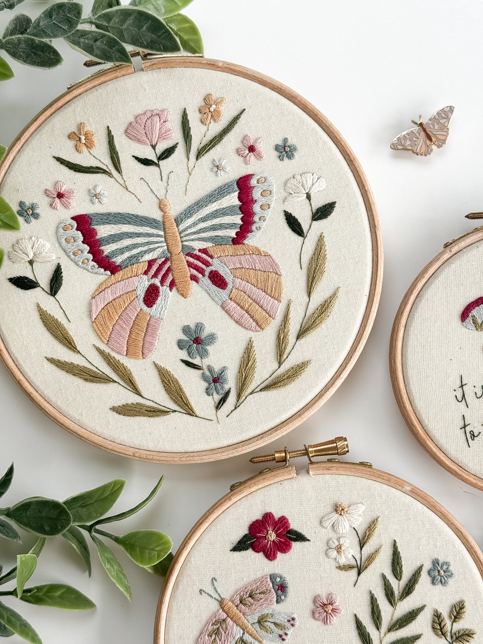 3 butterfly embroidery patterns and a magnetic needle minder