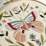 Embroidered butterfly and florals in pastel colours