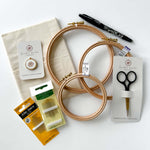 A flatlay of embroidery supplies. A bundle of the perfect embroidery supplies