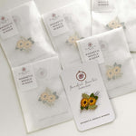 Several magnetic needle minders in packets