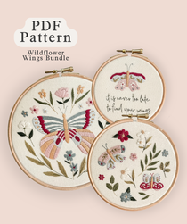 Wildflower Wings Butterfly Embroidery Pattern Bundle featuring three delicate butterfly designs in embroidery hoops.