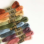 The skeins of thread included inside this embroidery kit