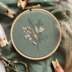 The Summer Harvest Embroidery Kit featuring thread an embroidery hoop and pattern booklet